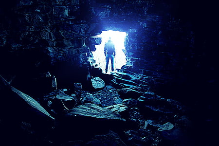 man outside cave thumbnail