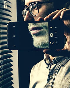 Person Holding Black Android Smartphone thumbnail