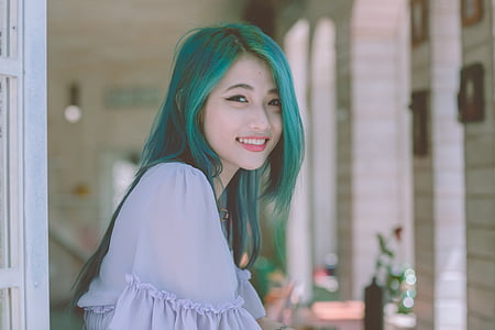 green haired woman thumbnail