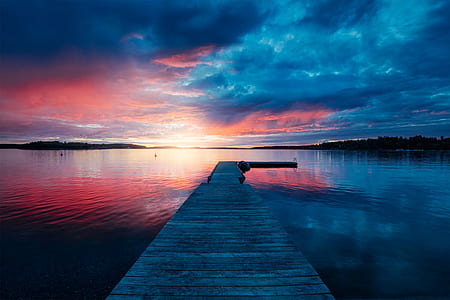 time lapse photograph of dock river thumbnail