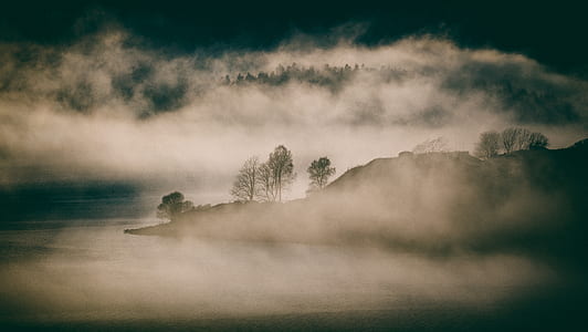 silhouette of mountain with fog thumbnail