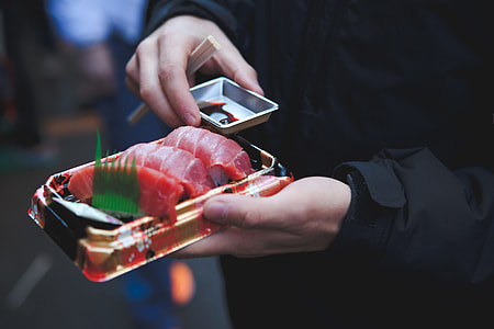 person holding tray of raw thumbnail