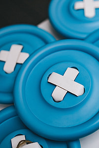 Close-ups of big blue plastic buttons thumbnail