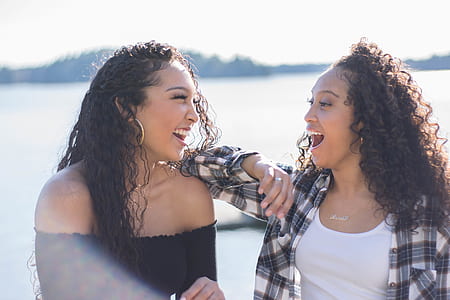 two womern laughing thumbnail