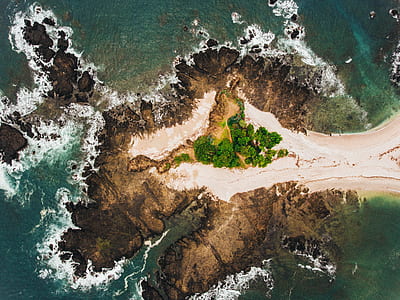 bird's-eye view photography of island thumbnail