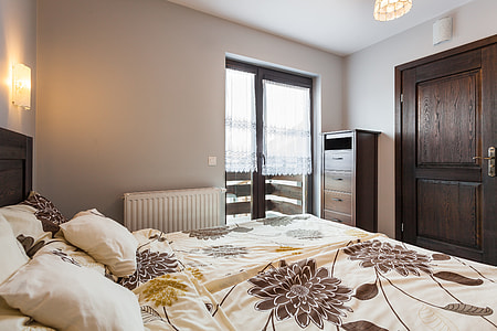 brown wooden dresser near the glass door thumbnail