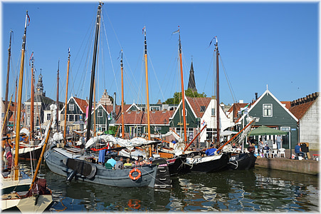 docked assorted-color boats thumbnail