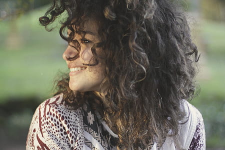 woman wearing white and red top thumbnail