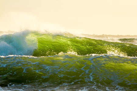 green sea waves during daytime thumbnail