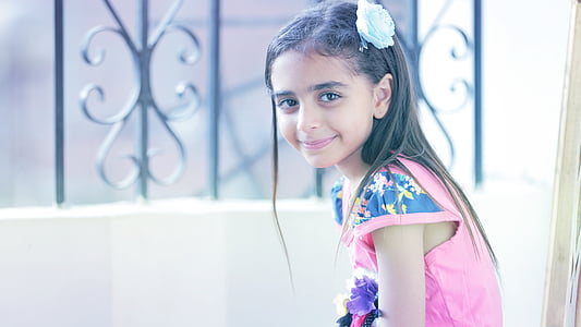 girl sitting near window thumbnail