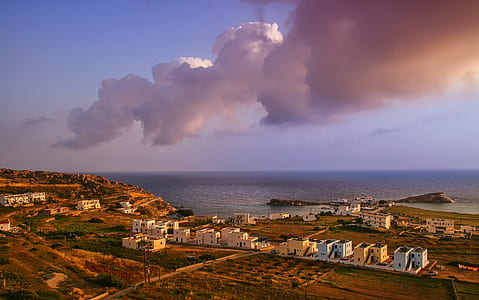 aerial photo of buildings near shoreline thumbnail