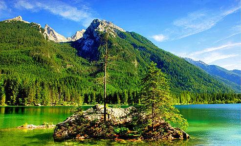 body of water near mountain thumbnail