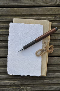 black ballpoint pen on booklet thumbnail