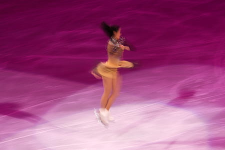 woman performing ice skating thumbnail