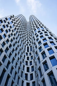 worm's eye view photography of high rise building thumbnail
