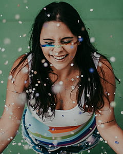 woman closing eyes smiling thumbnail
