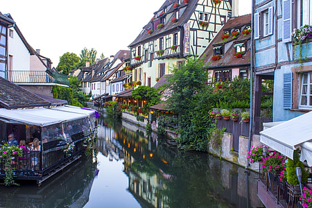 body of water surrounded by houses thumbnail