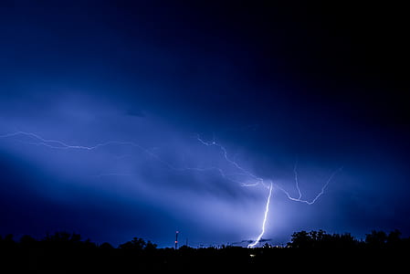 photo of blue lightning at night time thumbnail