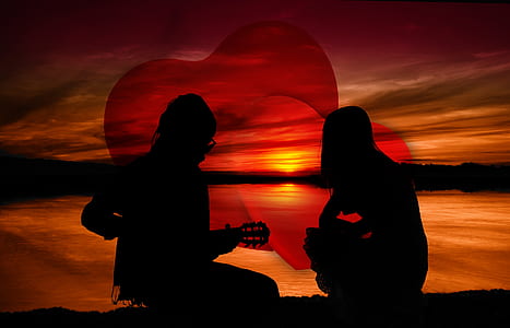 two silhouette of person by the sea thumbnail