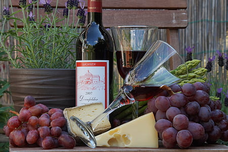 red liquor filled wine glasses thumbnail