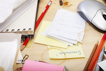 notes on top of brown wooden table thumbnail