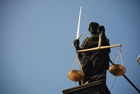 closeup photo of Lady Justice statue thumbnail