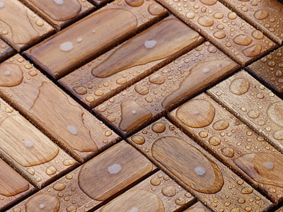 clear liquid on wooden blocks thumbnail