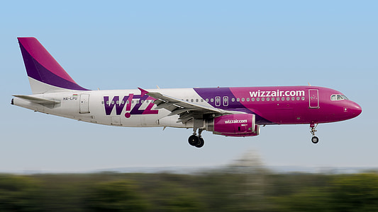 pink and white passenger plane thumbnail