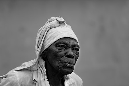 grayscale tilt-shift lens photography of a person thumbnail