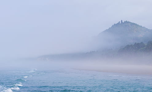 foggy mountain near body of wat thumbnail