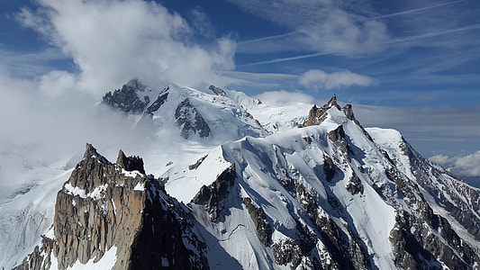 in distant photo of mountain peak thumbnail