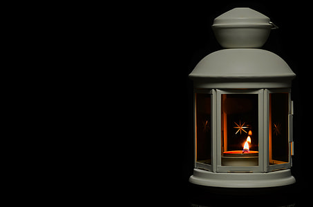 tealight candle in white lantern thumbnail