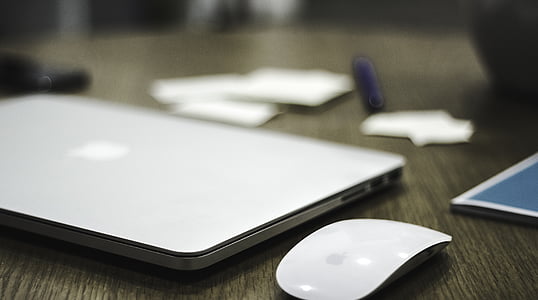 MacBook Pro beside Magic mouse thumbnail