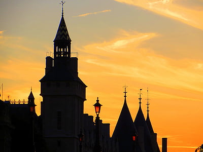 silhouette photography of building during golden hour thumbnail