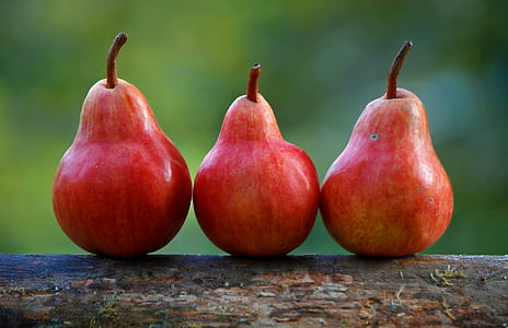 three red pear fruits thumbnail