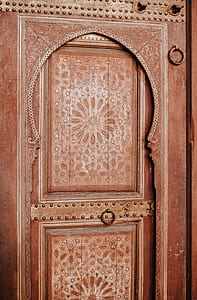 brown 2-paneled door with knocker thumbnail