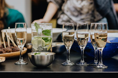Glasses with white wine and champagne thumbnail