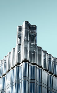 blue and white city building under clear sky during daytime thumbnail