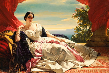 woman sitting on area rug holding hand fan thumbnail