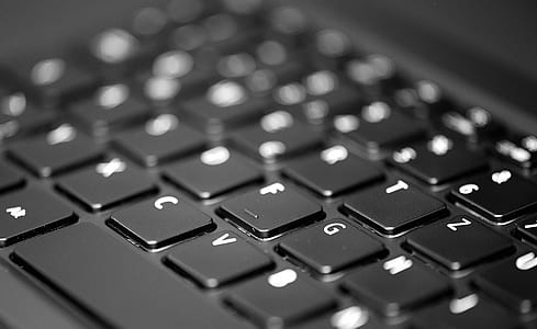 closeup photo of laptop keyboard thumbnail