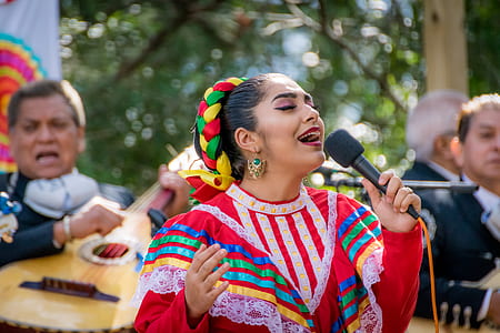 singing woman with band at daytime thumbnail