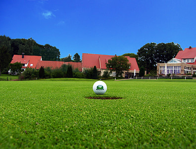 golf ball near hole thumbnail