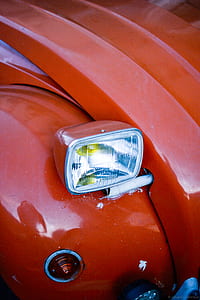 right vehicle headlight in closeup photography thumbnail