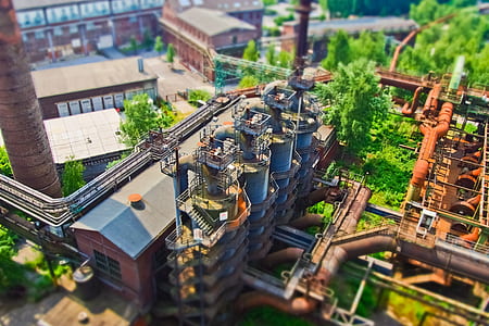 aerial photography of brown and gray concrete building at daytime thumbnail