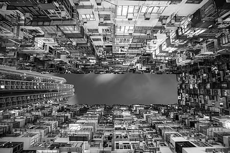 low-angle grayscale photo of high-rise buildings thumbnail