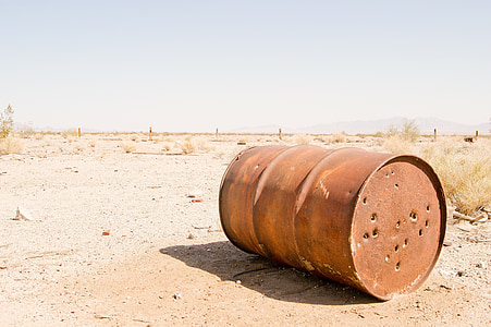brown barrel on desert during daytime thumbnail