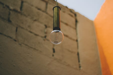 clear light bulb near wall thumbnail