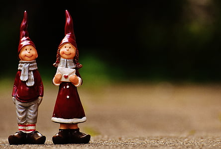 red boy and girl ceramic figurines thumbnail