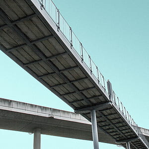 bottom's eyeview of gray suspension bridge thumbnail