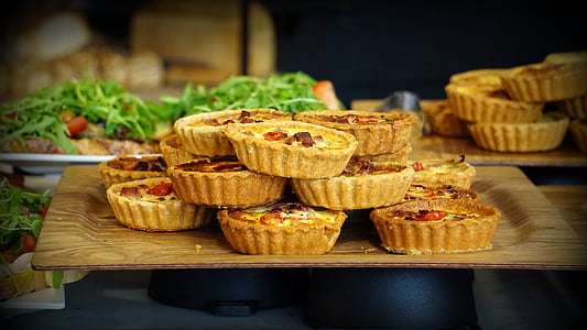 pile of baked pies on brown tray thumbnail